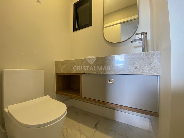 Apartamento em prédio com piscina na praia de Canto Grande