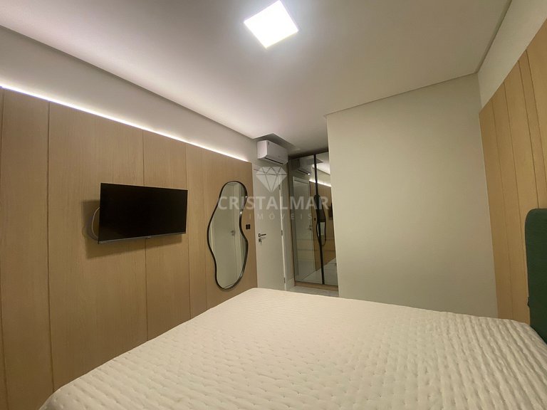 Apartment in a building with a swimming pool at Canto Grande