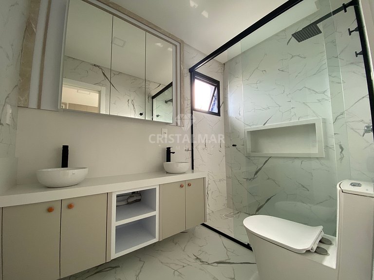 Apartment in a building with a swimming pool at Canto Grande